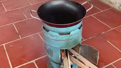 煤气罐制作的取暖炉图片