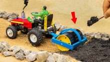 拖拉机在小农场里铺建沥青路面